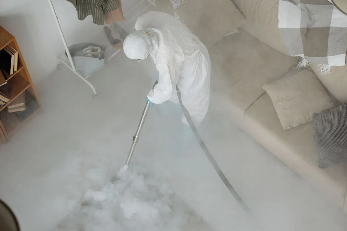 Biohazard cleanup technician in protective equipment, Marin City, CA